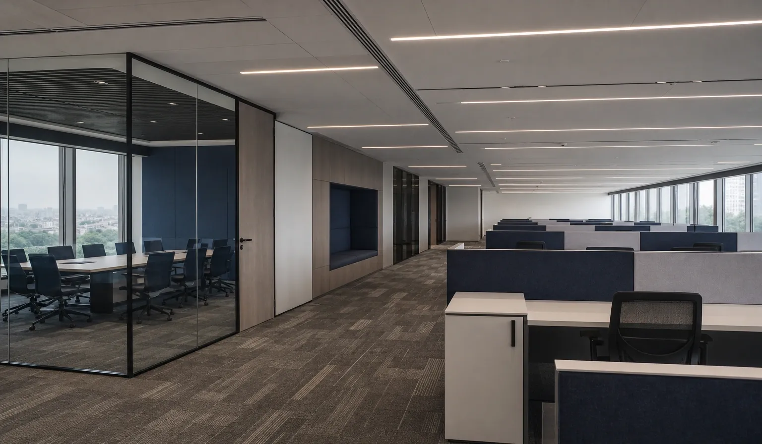 Bare-shell commercial floor part-way through a turnkey fit-out, with civil, MEP and ceiling works running together